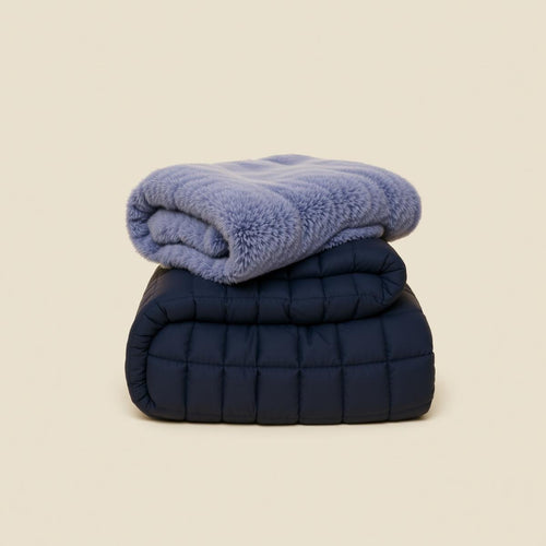 Cloud and Moonbeam Cozy Bundle with plush blanket layered over weighted blanket
